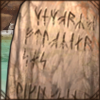 Runes are roughly carved on these stones, unable to be clearly read.